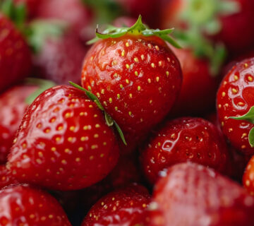 Background with delicious strawberries 1 scaled e1750868095847 360x320